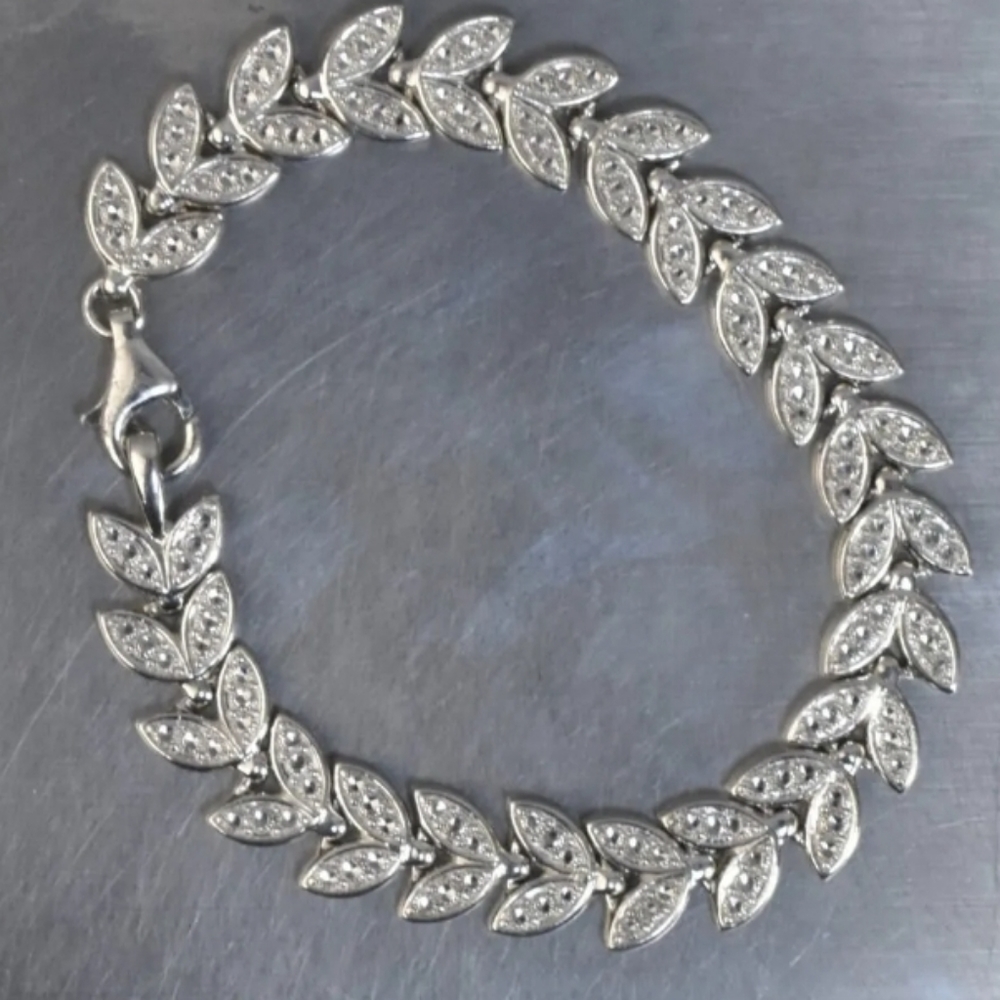 QVC 925 SS bracelet. 7.5", diamond-cut
